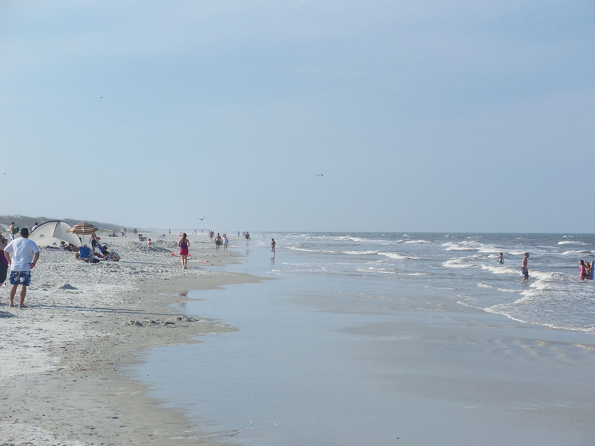Beachgoers and Atlantic surf at Anastasia State Park in 2010