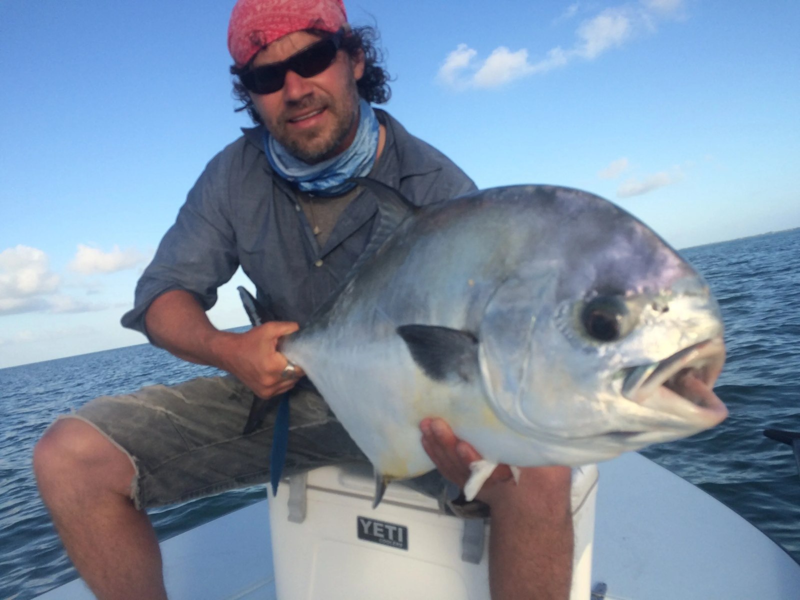 Angler holding a permit with Right On Charters