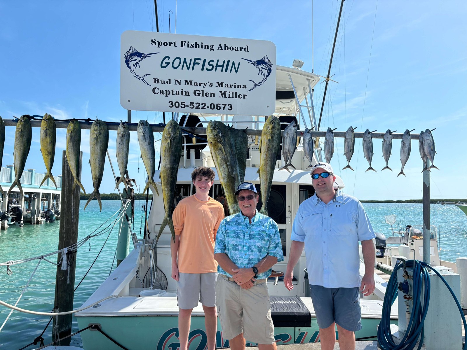 Anglers displaying their catch at the Gon Fishin Charters dock