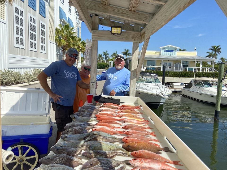 Bradenton Charters dockside table displaying the day catch