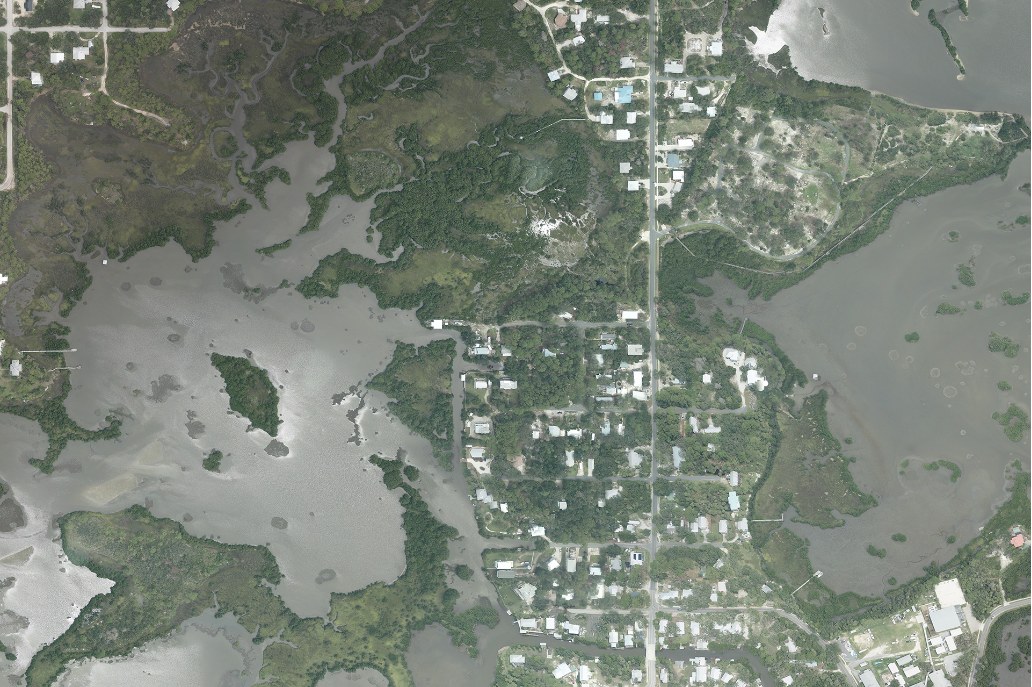 Aerial view of Cedar Key and surrounding shallow island waters in August 2024