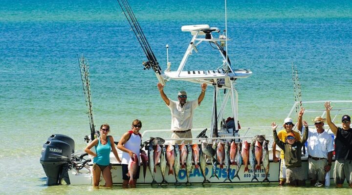 Fishing party and boat at Grayton Beach