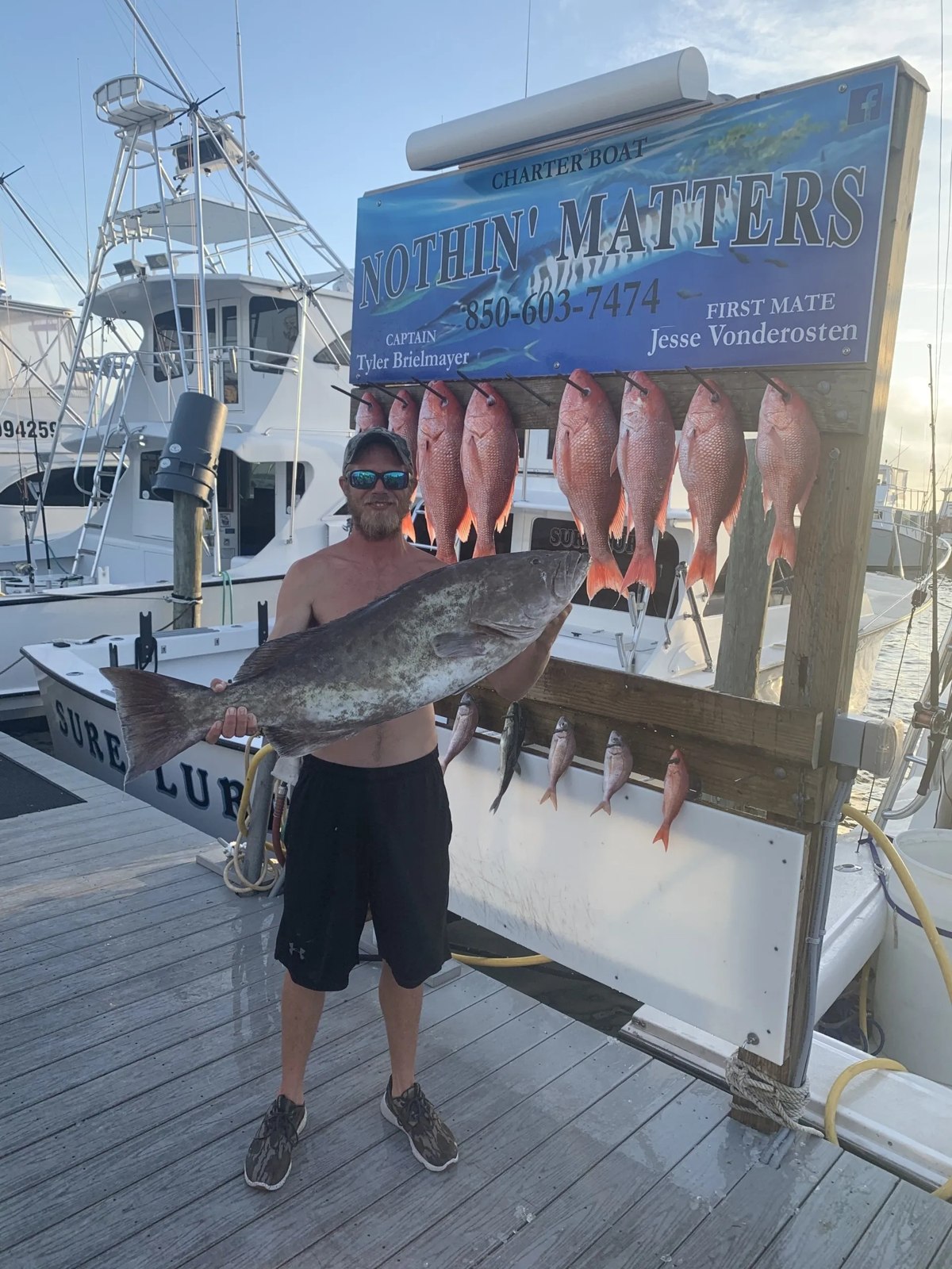 Angler with a dockside catch