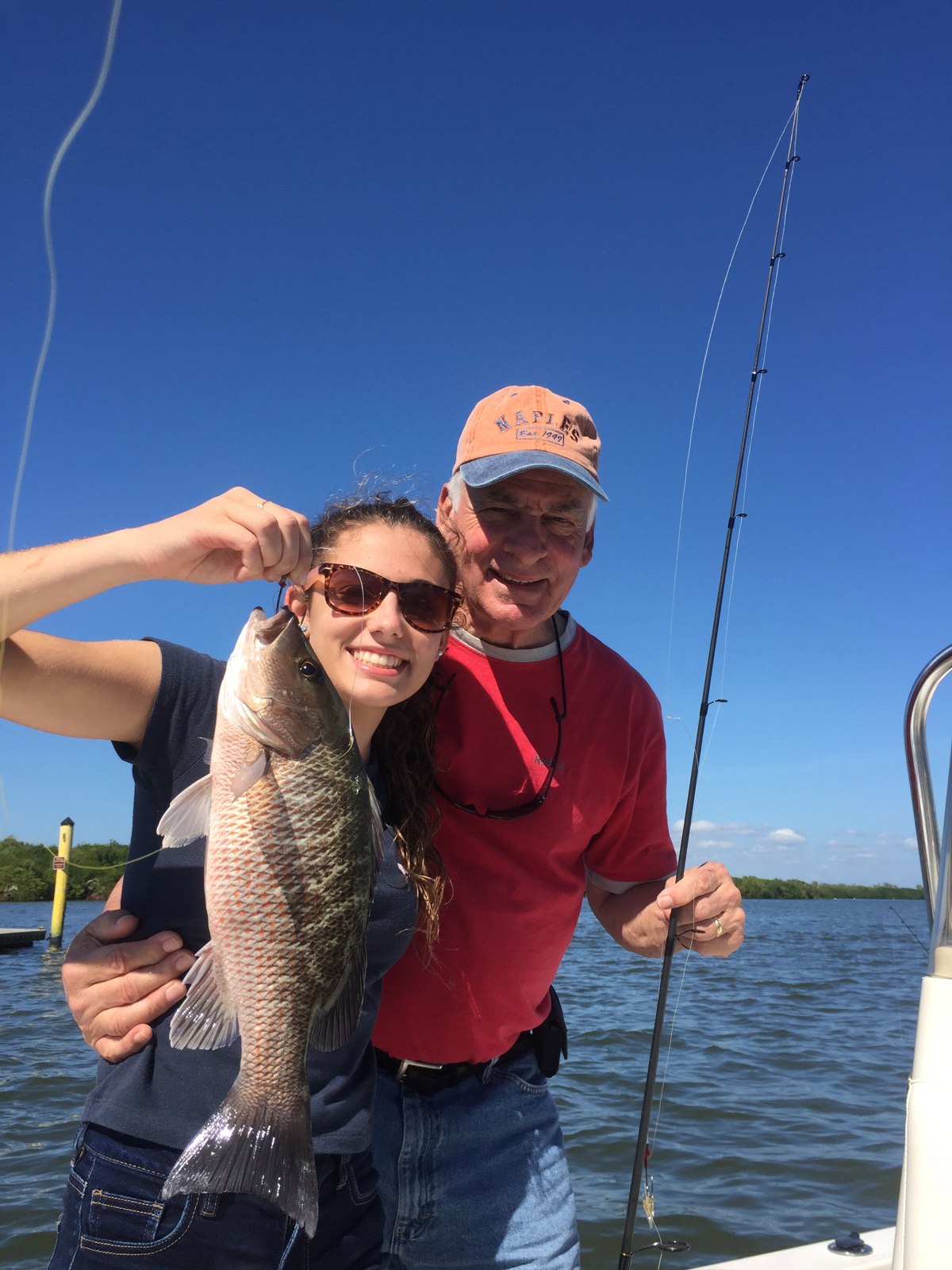 Fish Face Charters guests displaying a grouper