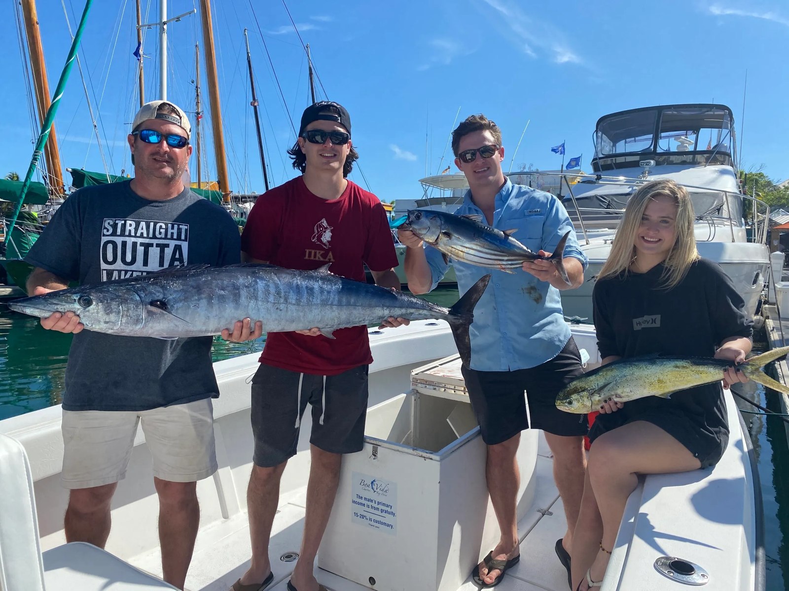 Fishing group displaying a wahoo with Boa Vida Charters