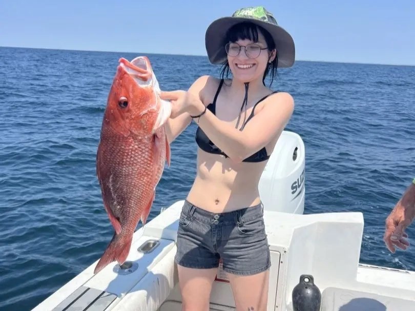 Angler holding a snapper