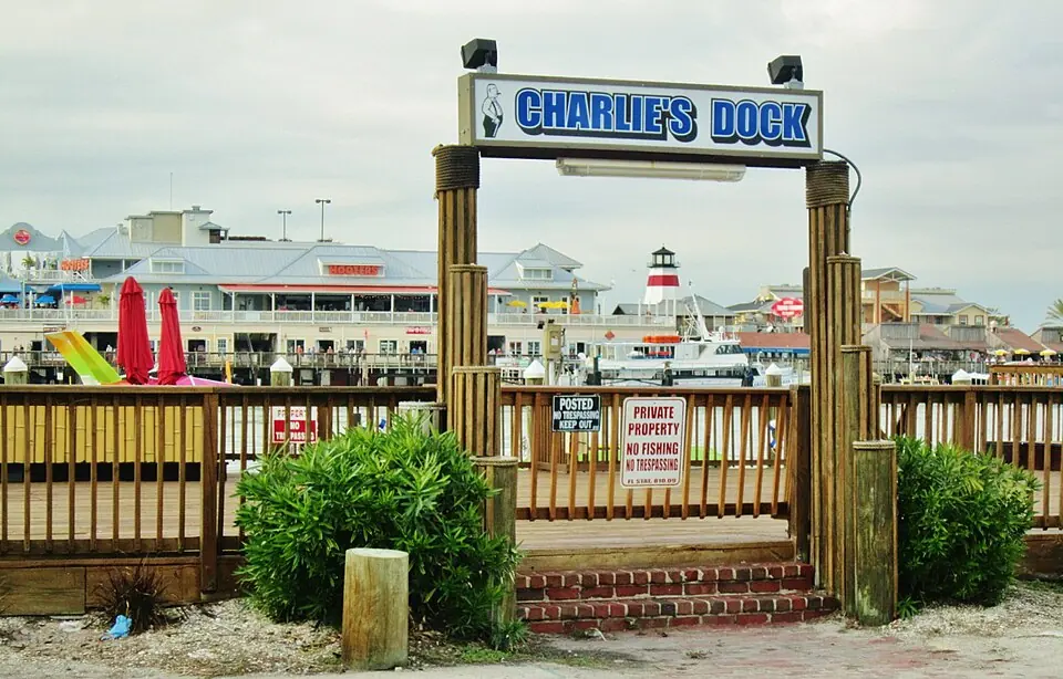 John's Pass Boardwalk and Charles's Dock sign at Madeira Beach