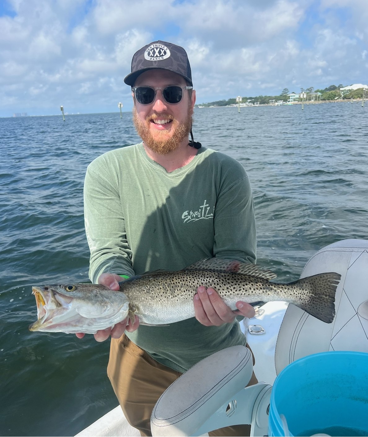 Angler holding a redfish