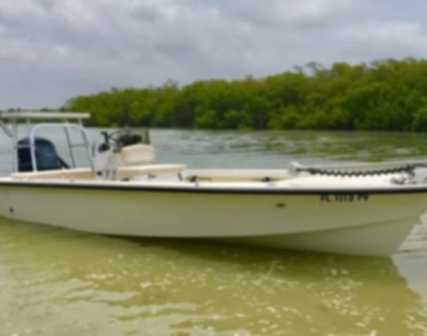 Redfish Rob's Charters yellow hulled bay boat