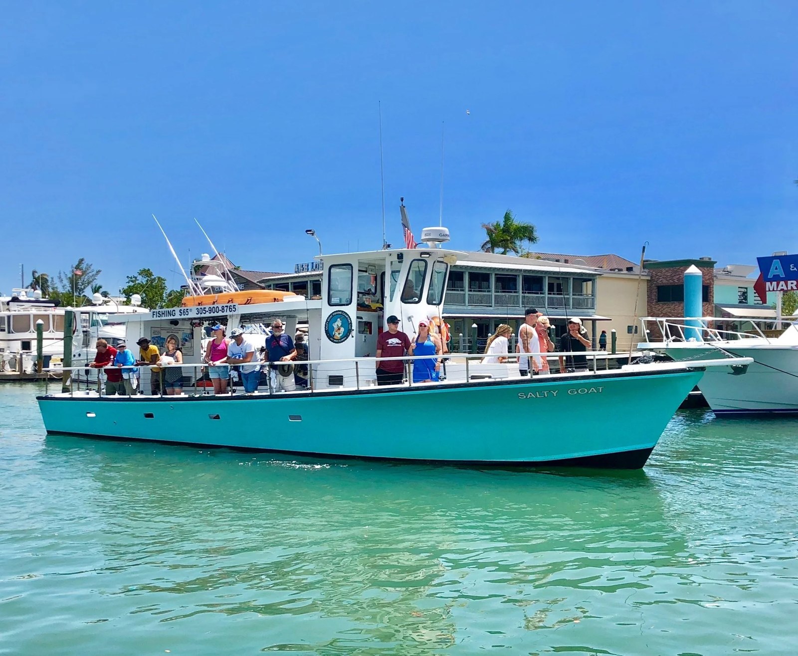 Salty Goat party fishing boat on the water with Salty Goat Fishing Charters