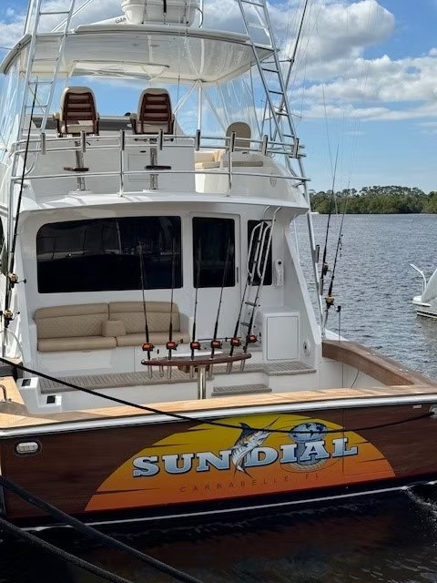 Stern of the Sun Dial sportfishing boat tied at the dock