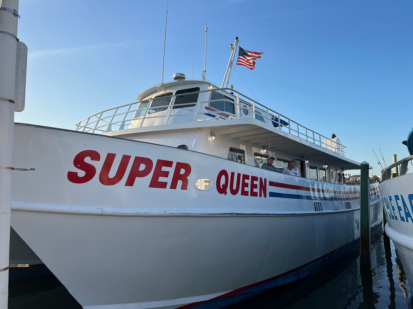 Super Queen passenger fishing boat docked at the marina
