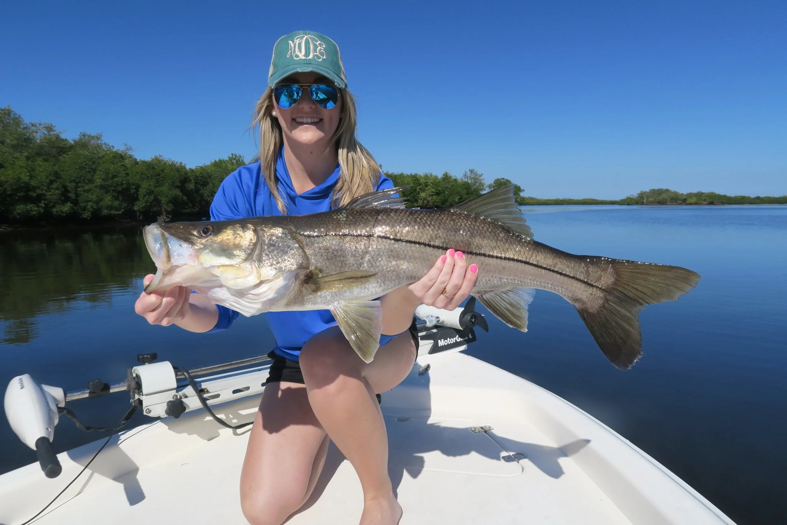 Task Force Fishing Charters angler holding a snook