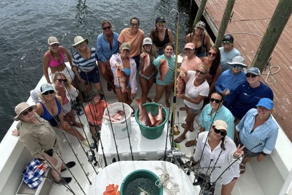 Fishing group displaying its catch