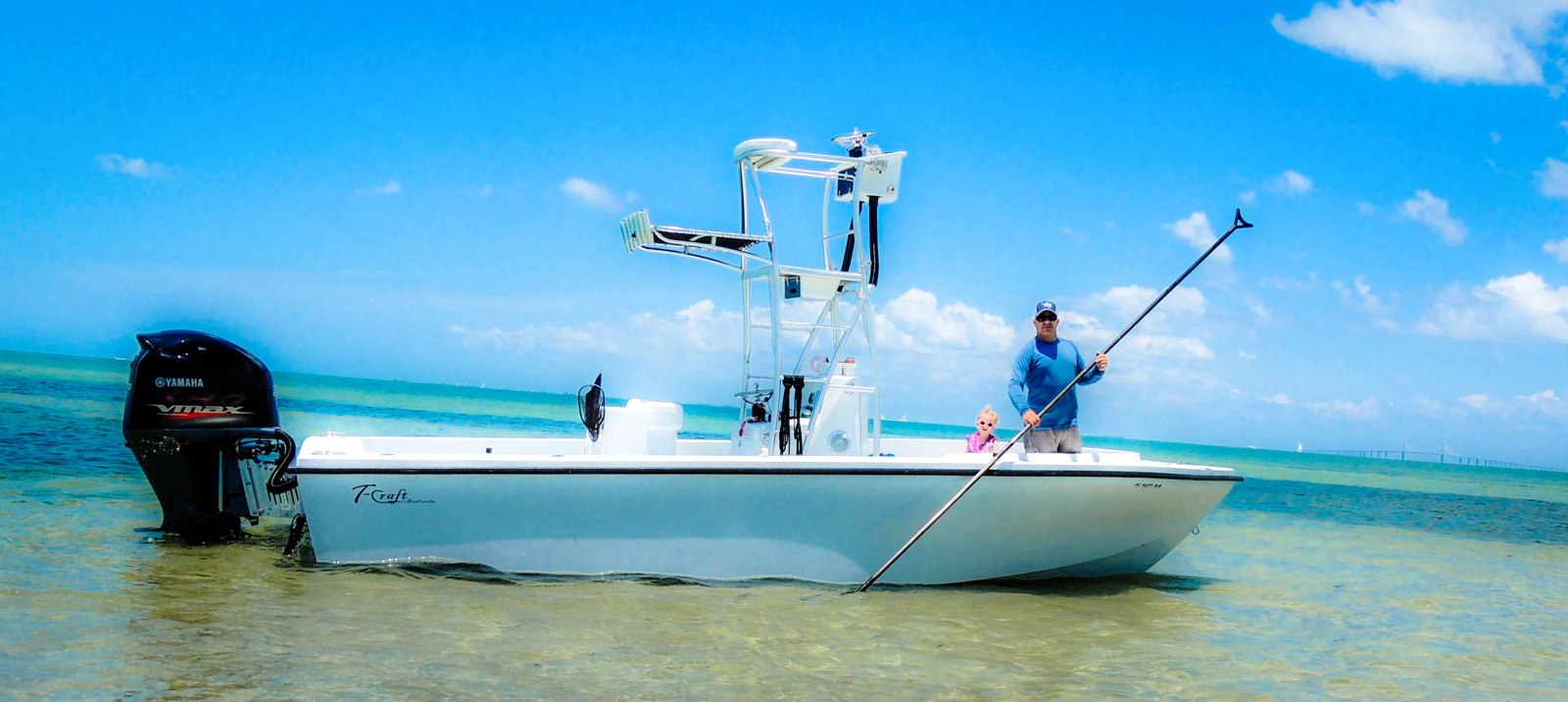 Anna Maria Inshore Fishing boat with tower in shallow water