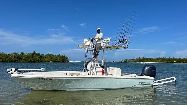 Captain Marc Kroseberg on the tower of his Wiggins Bay fishing boat