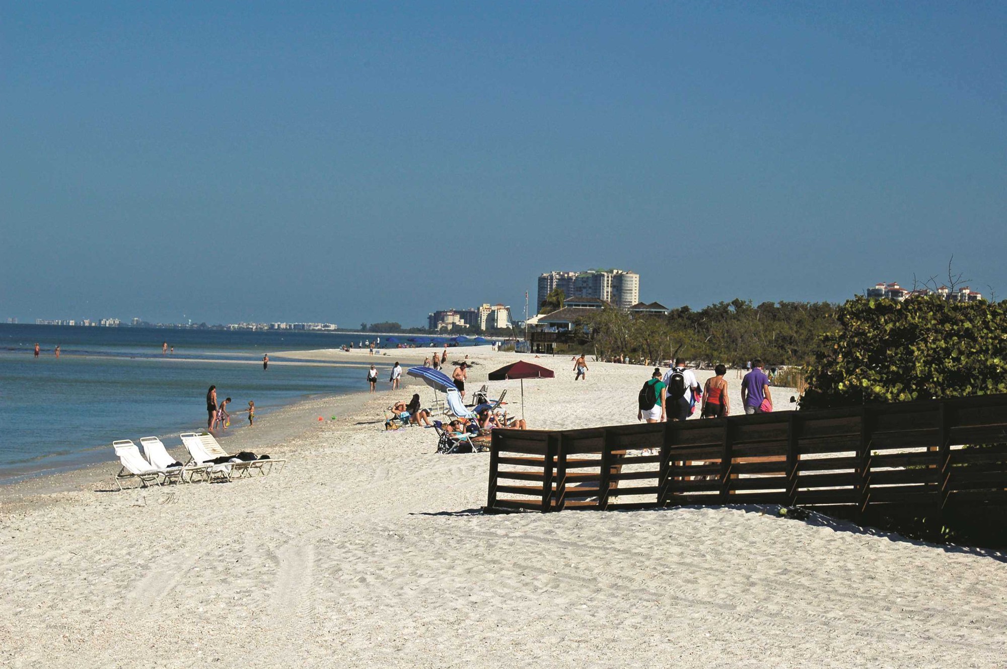 Visitors and Gulf beach at Clam Pass Park