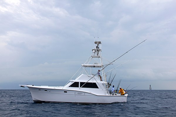 Cutting Edge Hatteras charter boat on the water