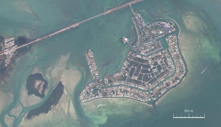 Aerial view of Duck Key, nearby Toms Harbor Keys and shallow surrounding water
