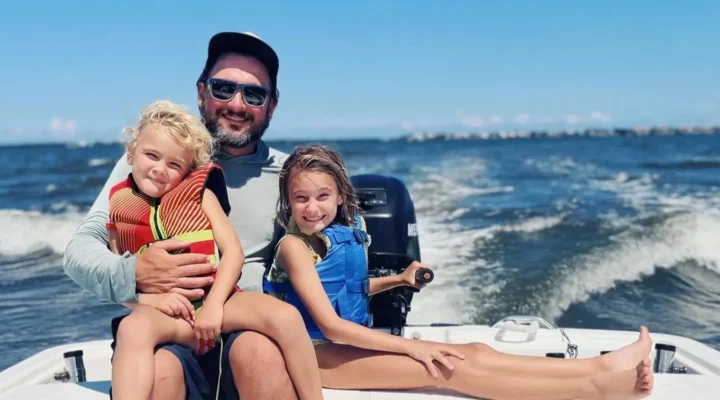 Family seated aboard the fishing boat while underway
