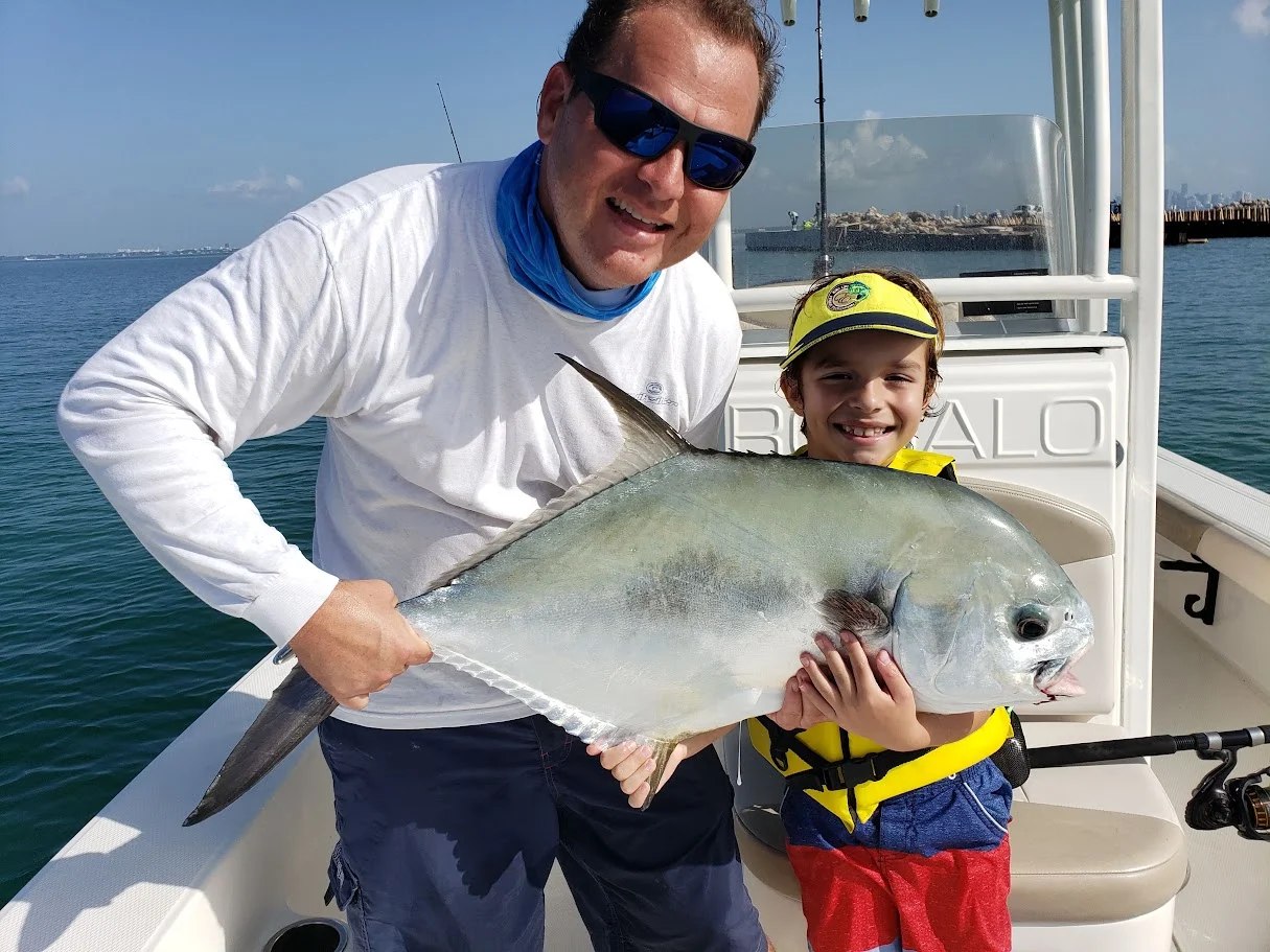 Florida Native adult and young angler with a permit