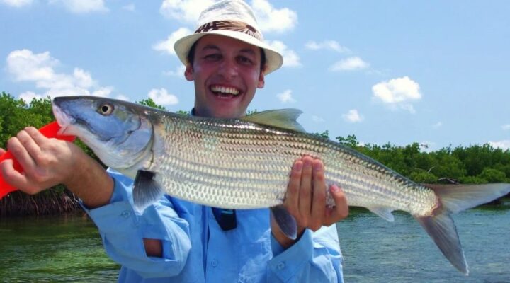 Florida Native angler holding a bonefish