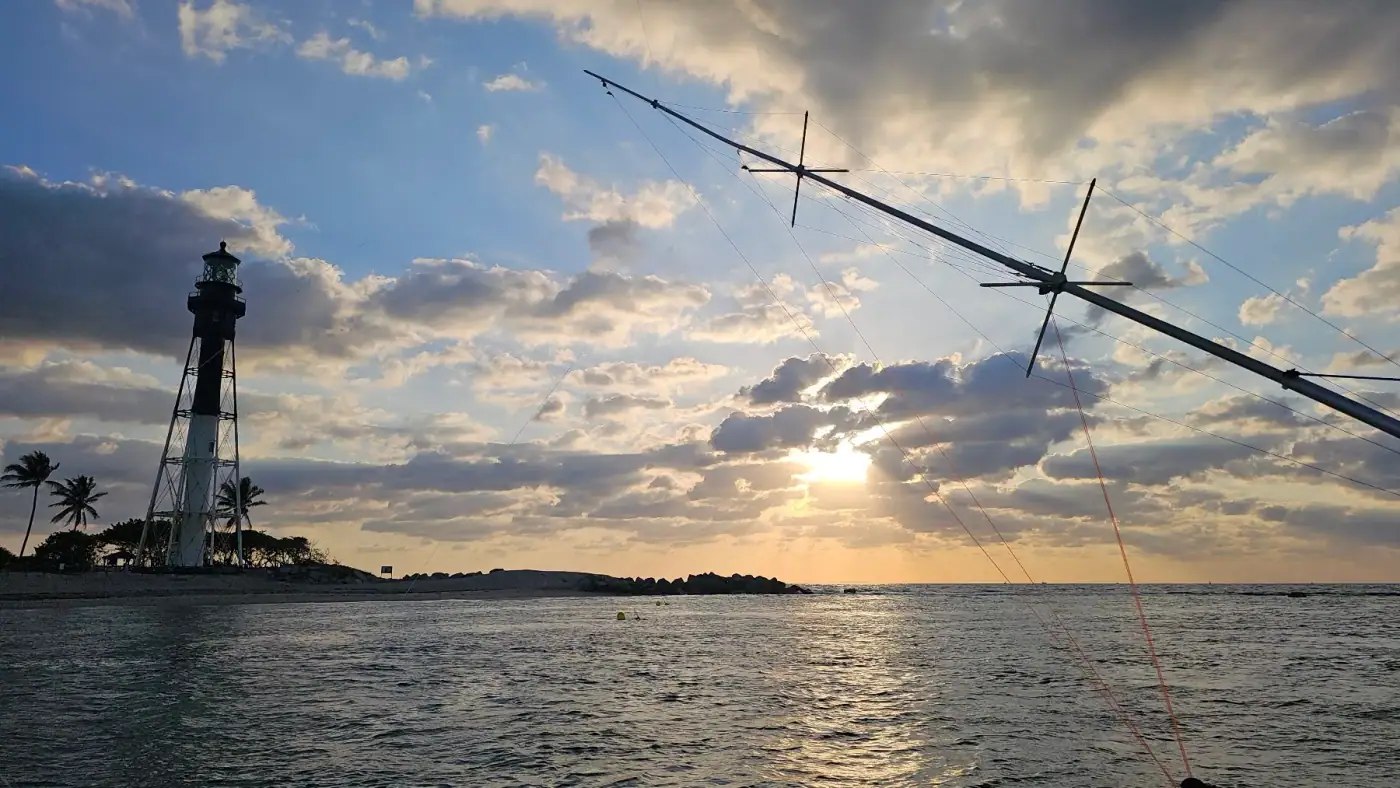 Hillsboro Inlet lighthouse and fishing rod at sunrise on a Gradyful trip