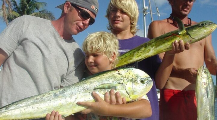 Hot Shot fishing family with mahi mahi