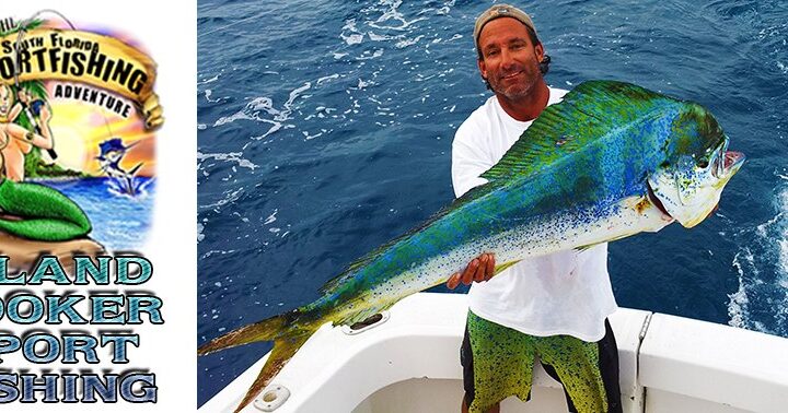 Island Hooker angler holding a mahi mahi