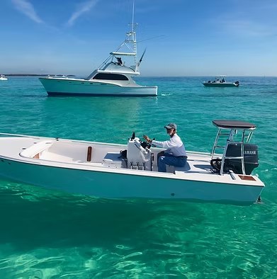 Ivory Keys fishing skiff floating in clear Islamorada water
