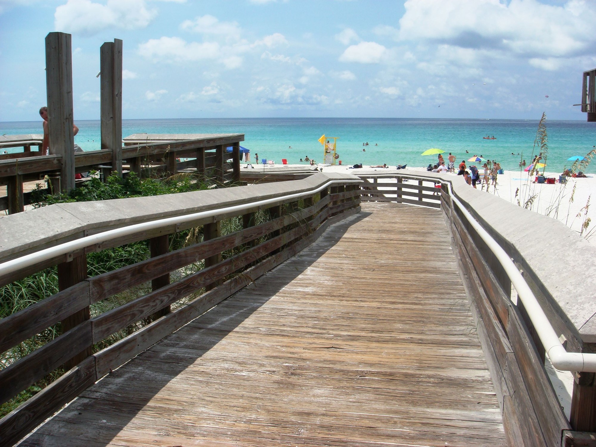 Wooden access ramp leading to June White Decker Beach Park shore