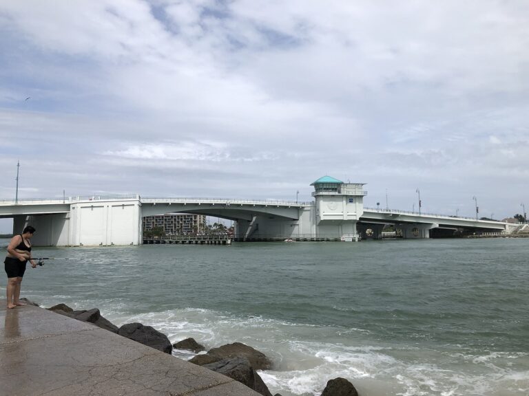 Johns Pass Bridge and tidal water at Madeira Beach in June 2020