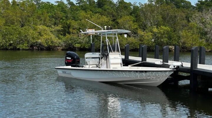 Miami Bay Pathfinder fishing boat beside mangroves