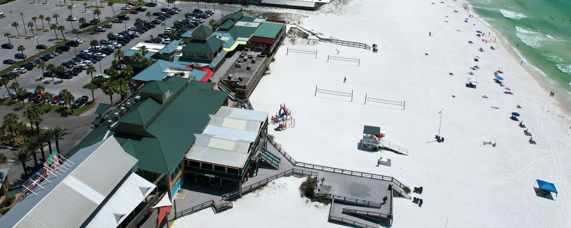 Aerial view of the Boardwalk buildings and beach at Newman Brackin Wayside Park
