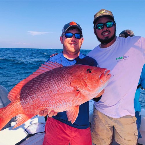 Panhandle Fishing Charters anglers displaying red snapper catches