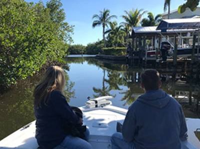 Pine Island Boat Tours guests cruising a narrow waterway