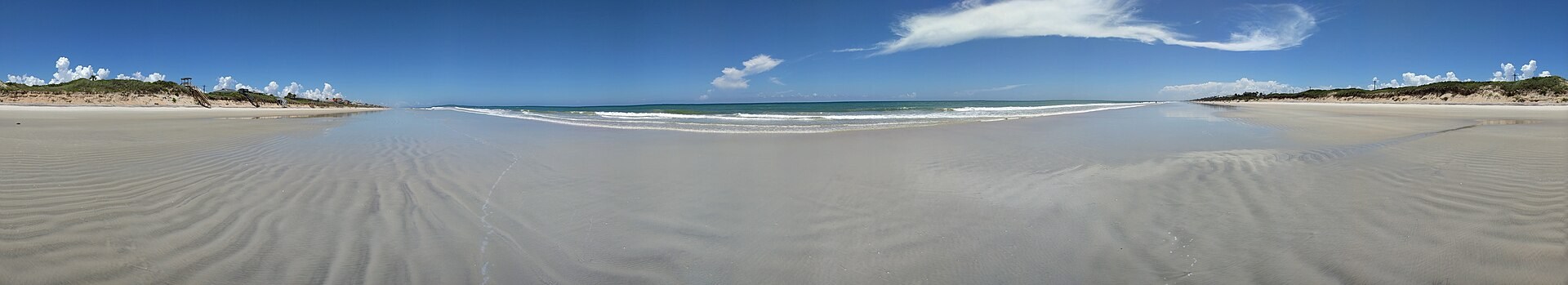 Wide view of wet sand and Atlantic surf at South Ponte Vedra Beach