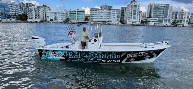 Reel Addiction charter boat on Sarasota water