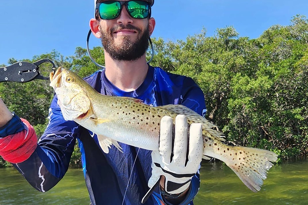 Reel Fintastic Charters angler displaying a spotted seatrout