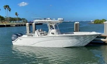Sarasota Reef Charters Sea Fox center-console boat at the marina