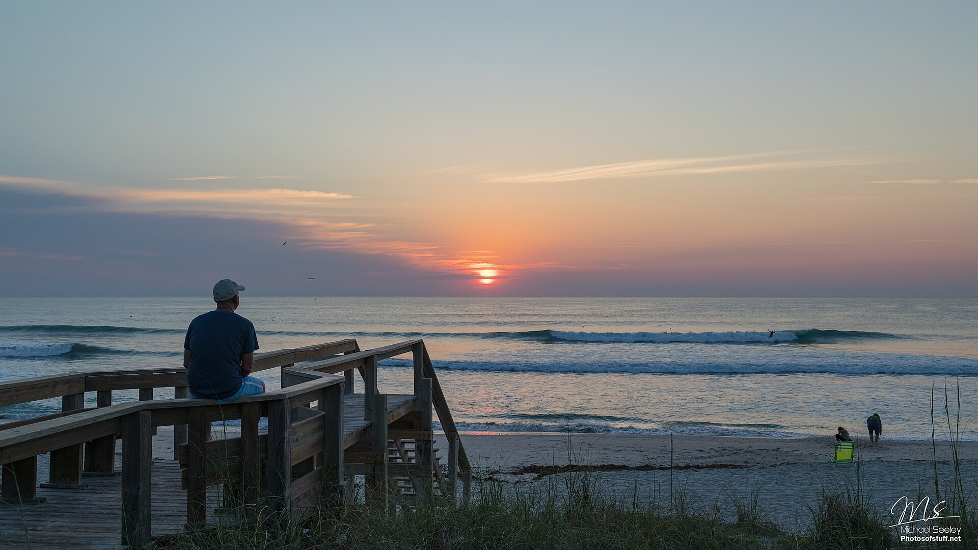 Sunrise over Satellite Beach with a beach crossing in the foreground