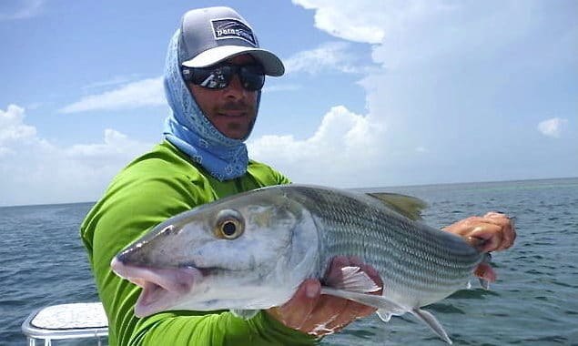 Shallow Tails angler holding a bonefish