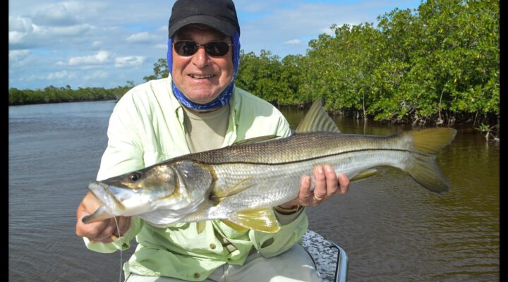 Silver King angler holding a snook
