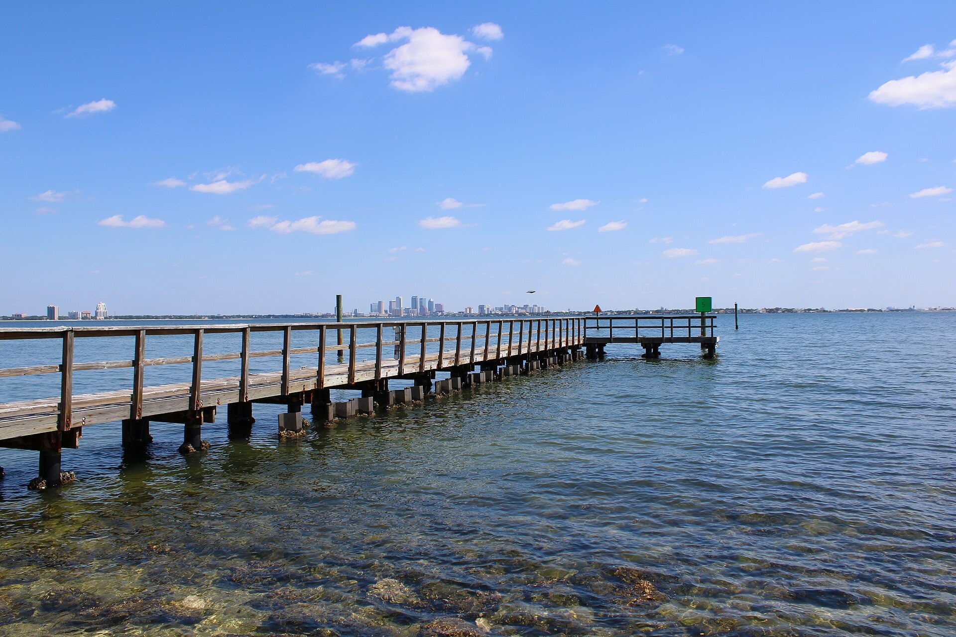 Ballast Point waterfront pier and distant Tampa skyline in April 2024 before hurricane damage