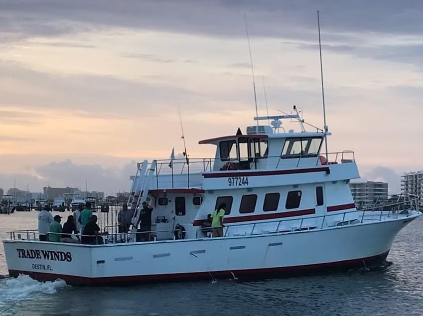 TradeWinds fishing boat tied beside the Destin dock