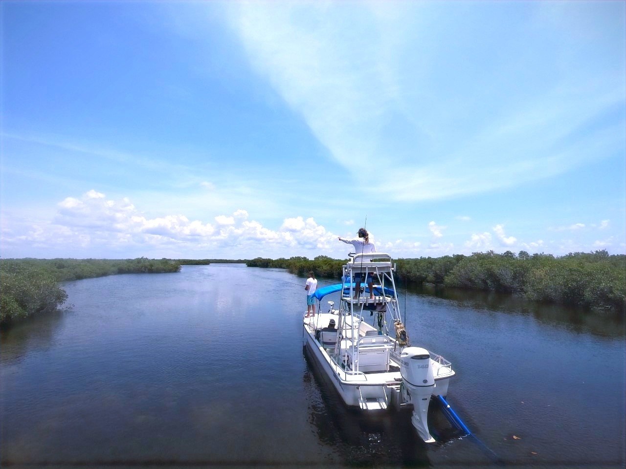 Tried and True fishing skiff on a mangrove-lined waterway