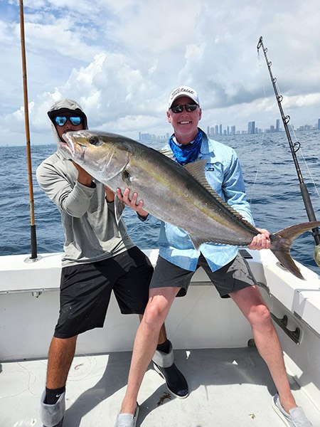 YB Normal angler holding an amberjack